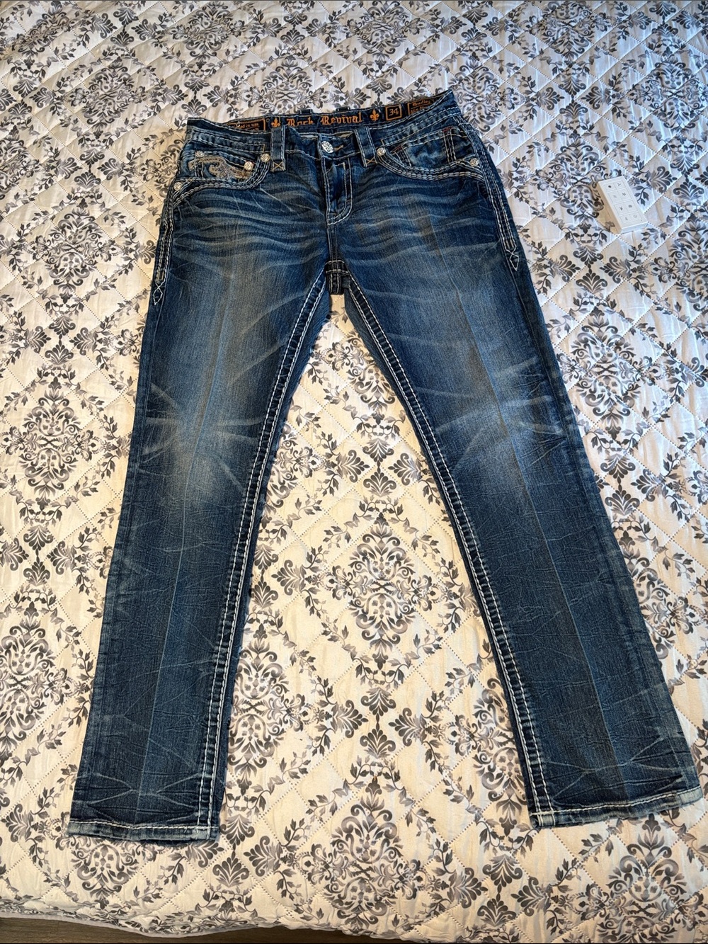 Rock Revival men’s Straight Leg Jeans in Distressed Dark Blue